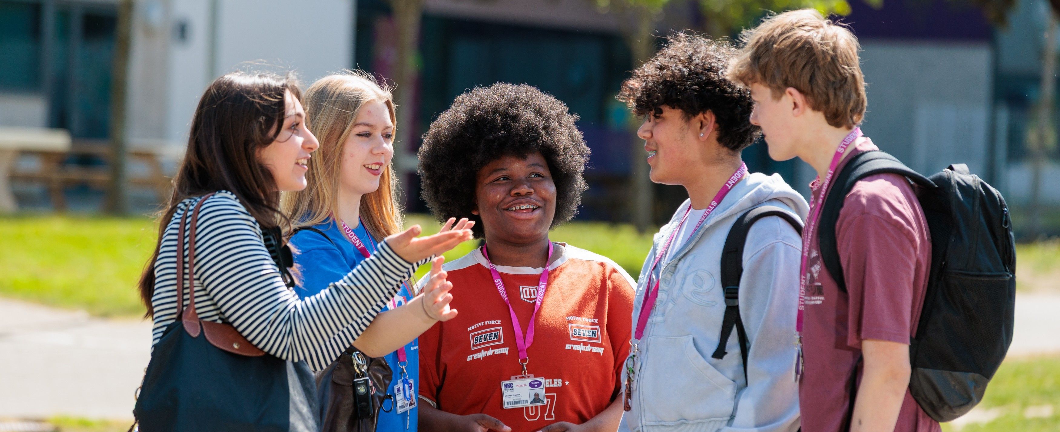 landcape-group-of-students-talking-outside
