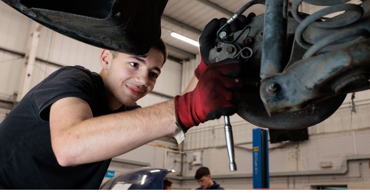 landscape_motor_vehicle_students_working_on_car_2026